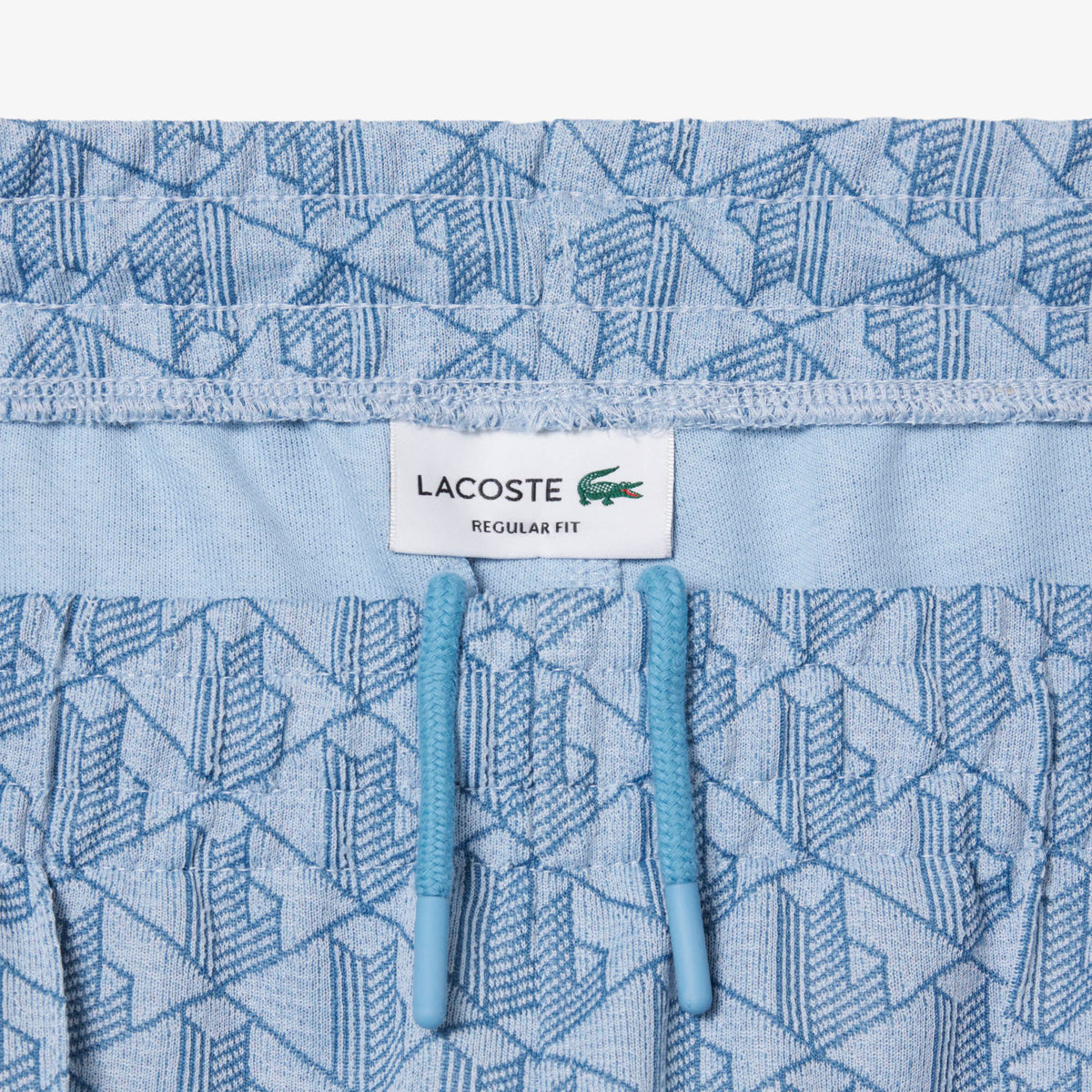 PANTALONE MONOGRAM LACOSTE